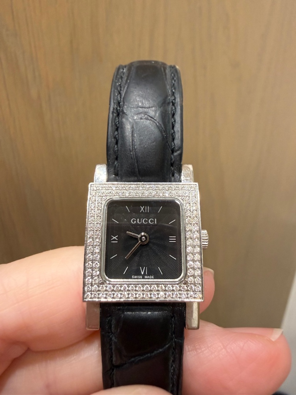 Gucci watch with diamond bezel